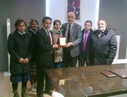 Aşkale'de Yurt Sorununu Çözen Yücelik'e Plaket Verildi