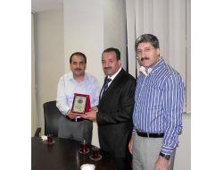 Digiad’dan, Adana’ya Atanan Okumuş’a Plaket