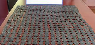 SİKKELERLE YAKALANDI