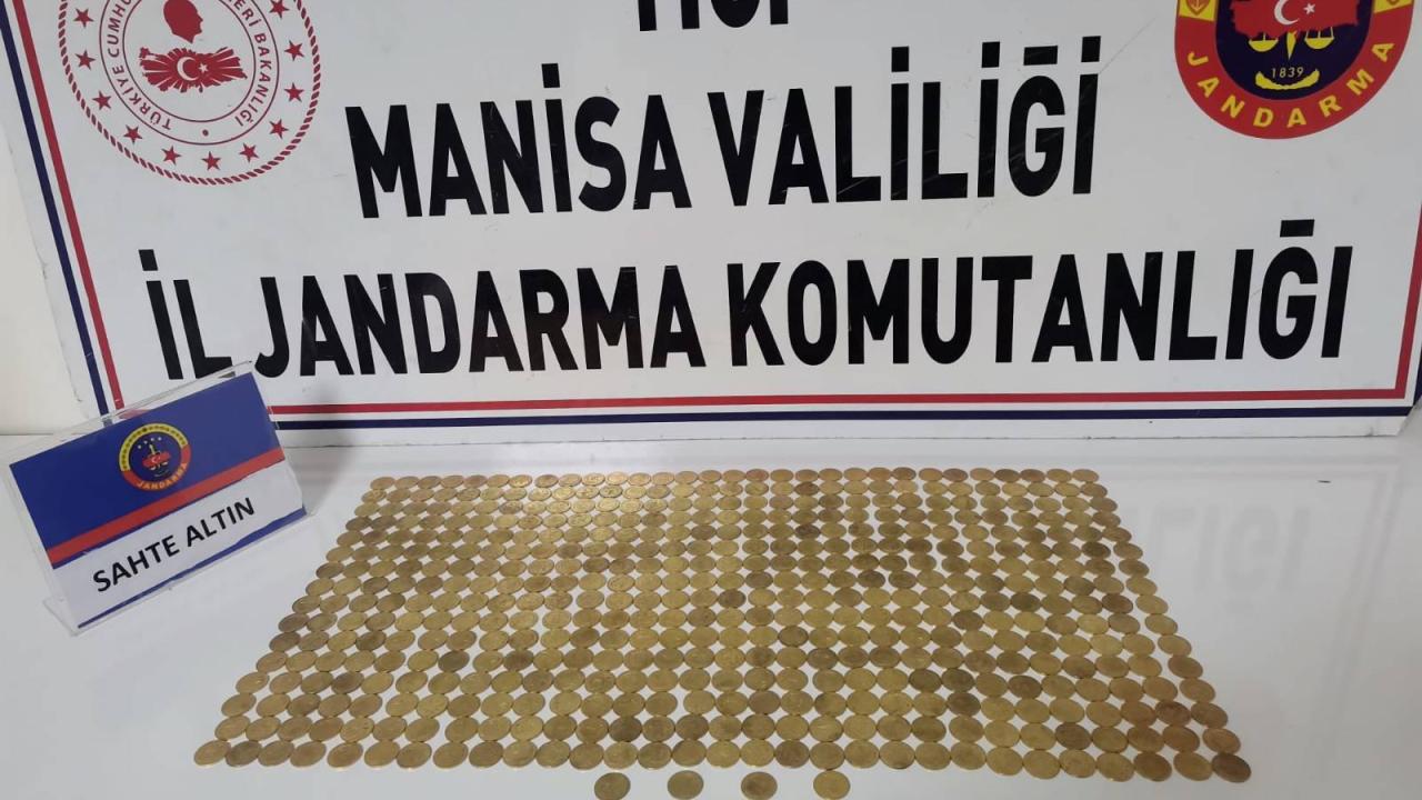 Manisa'da sahte sikkelerle dolandırıcılık şüphesiyle 2 gözaltı