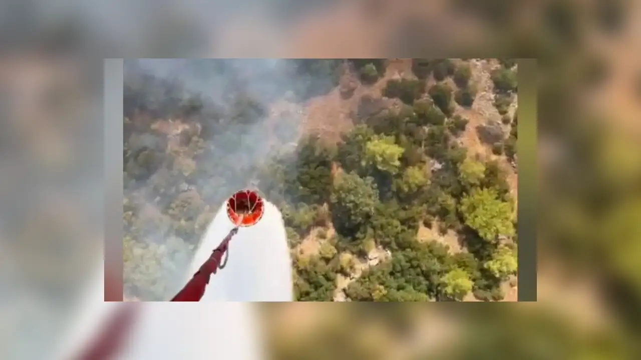 Antalya'da orman yakınında çıkan yangına müdahale ediliyor