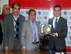 Mahalle Sakinlerinden Tütüncü'ye Teşekkür Plaketi